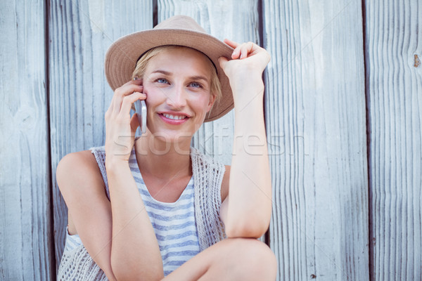 Pretty blonde woman calling on the phone Stock photo © wavebreak_media