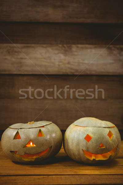 High angle view of jack o lanterns on table during Halloween Stock photo © wavebreak_media