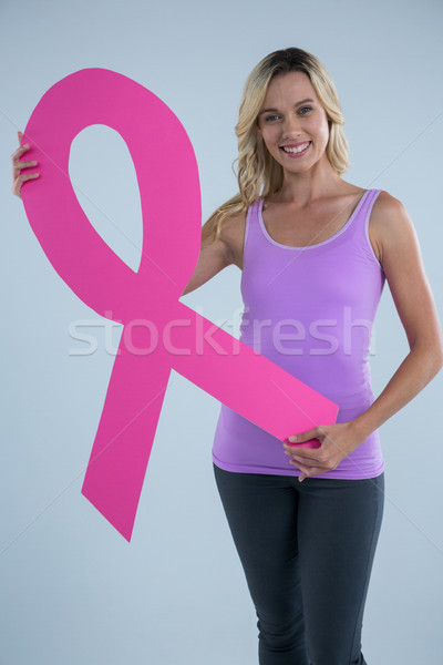 肖像 年輕 女 顯示 紙板 乳腺癌 商業照片 © wavebreak_media