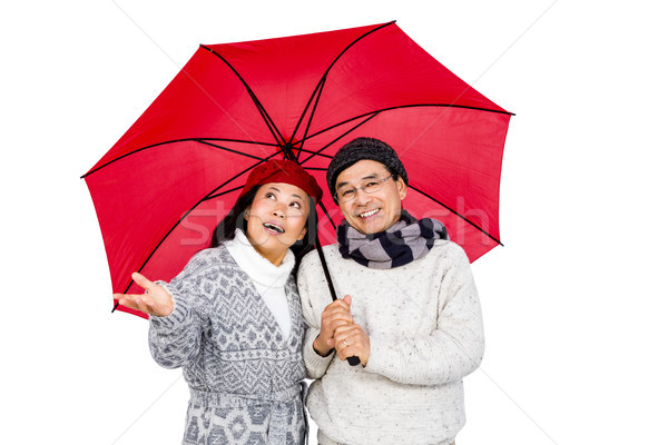 Idősebb ázsiai pár esernyő fehér nő Stock fotó © wavebreak_media