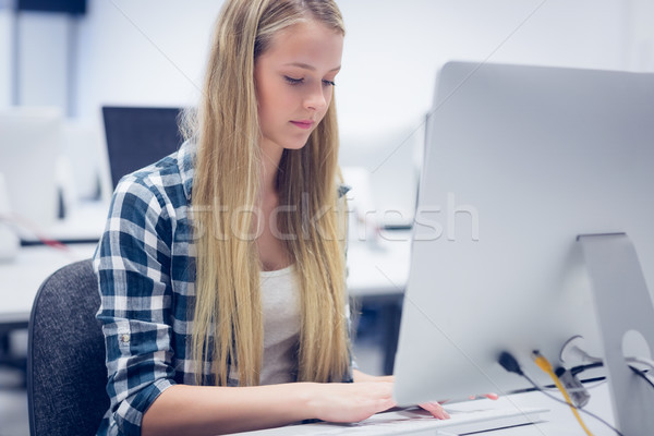 Serious student working on computer  Stock photo © wavebreak_media