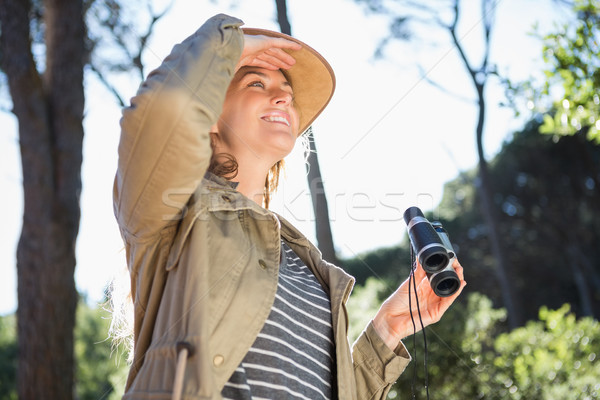 Woman using binoculars Stock photo © wavebreak_media
