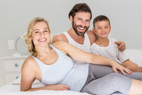 [[stock_photo]]: Portrait · parents · fils · séance · lit · chambre