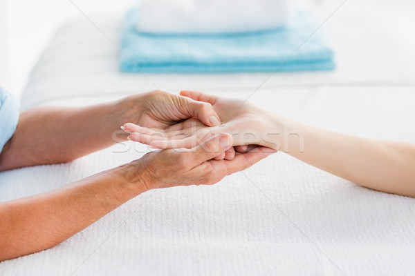 Cropped image of woman receiving hand massage Stock photo © wavebreak_media