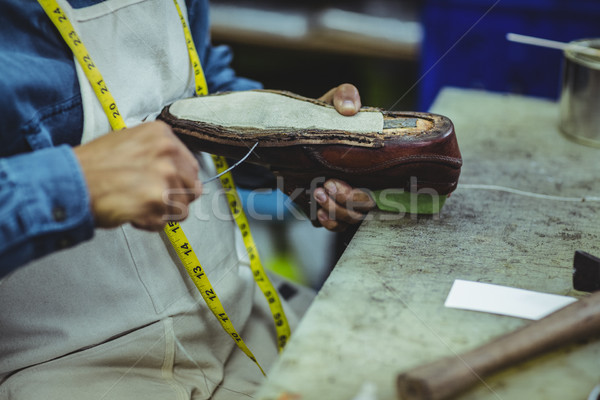 Shoemaker repairing a shoe Stock photo © wavebreak_media