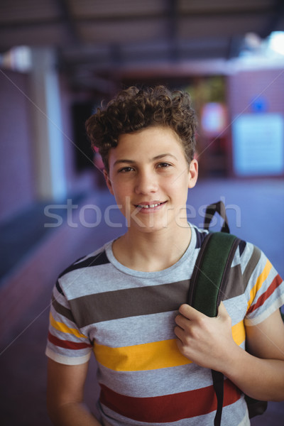 Boldog iskolás fiú áll iskola kampusz portré Stock fotó © wavebreak_media