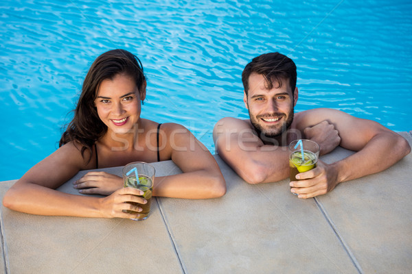Portret relaxare piscină tineri romantic Imagine de stoc © wavebreak_media
