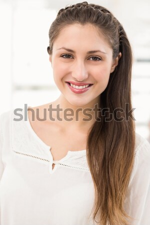 Charismatic businesswoman looking at the camera Stock photo © wavebreak_media