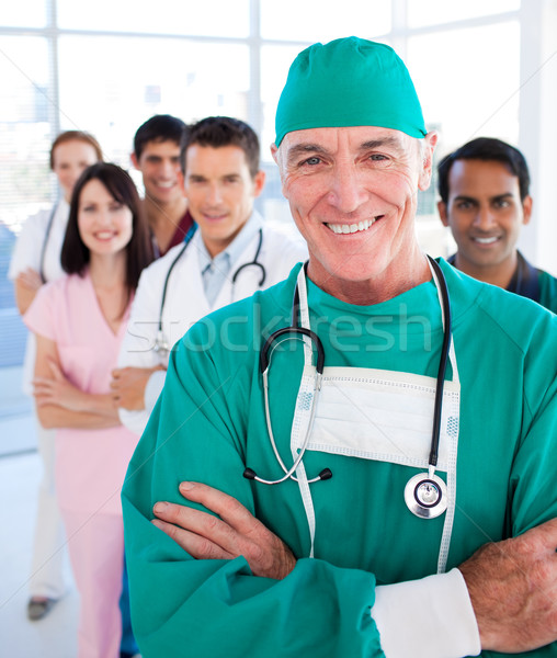 Több nemzetiségű orvosi csoport mosolyog kamera kórház Stock fotó © wavebreak_media