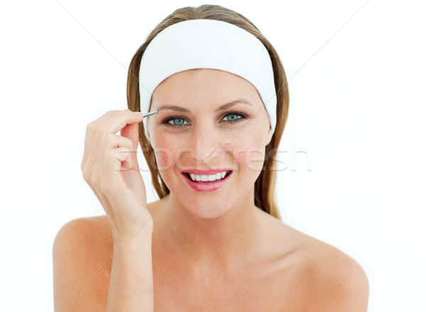 Attractive woman using tweezers Stock photo © wavebreak_media