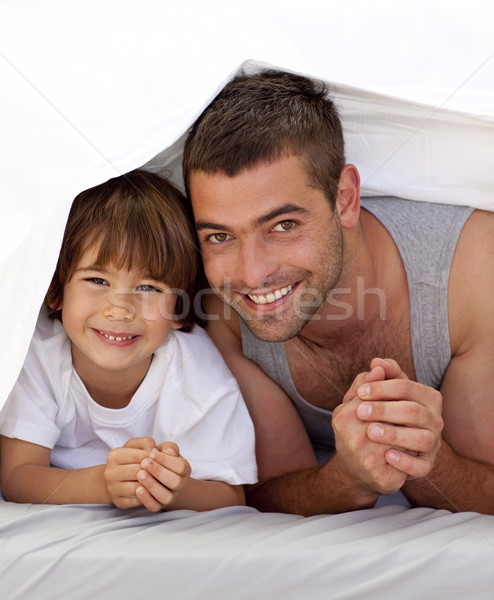 Father and son together under the bedsheets Stock photo © wavebreak_media