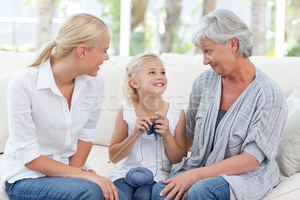 Stock photo: Family knitting together at home