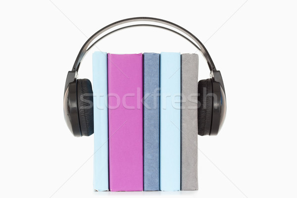 Close up of books and headphones against a white background Stock photo © wavebreak_media