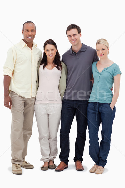 Two couples smiling against white background Stock photo © wavebreak_media