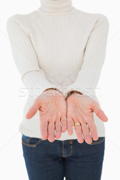 Woman standing with her hands out Stock photo © wavebreak_media