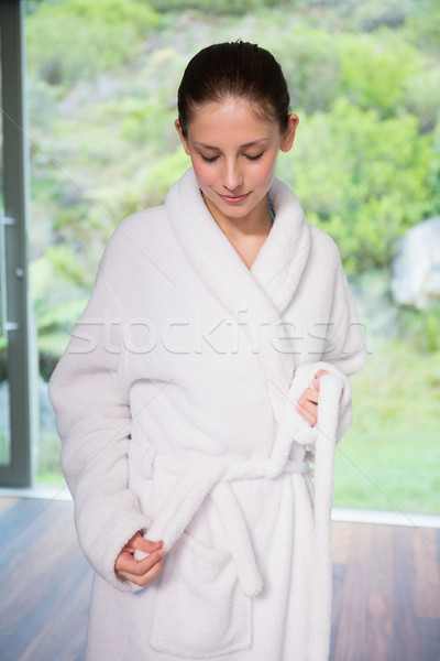 Fiatal nő visel fürdőköpeny elmosódott növények női Stock fotó © wavebreak_media