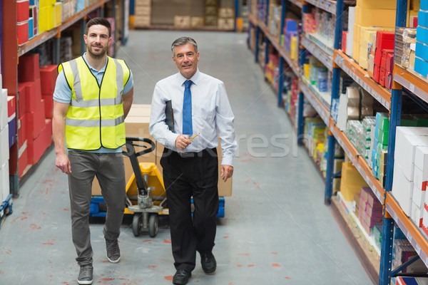 Warehouse worker talking with his manager Stock photo © wavebreak_media