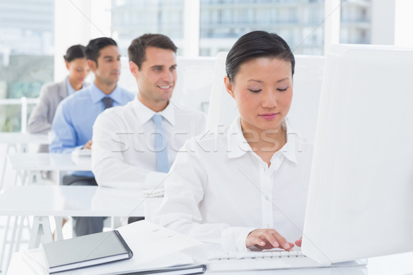 Concentrate work team using computer  Stock photo © wavebreak_media