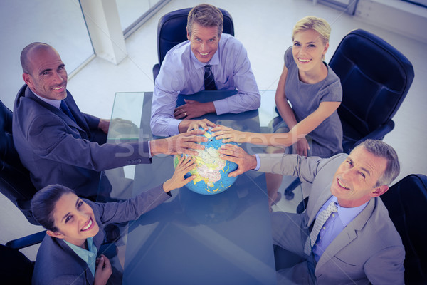 Stockfoto: Business · team · handen · wereldbol · vergadering · business · man