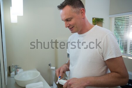 улыбаясь салона работник складе книга работу Сток-фото © wavebreak_media