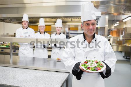 Chefs chopping vegetables in the commercial kitchen Stock photo © wavebreak_media