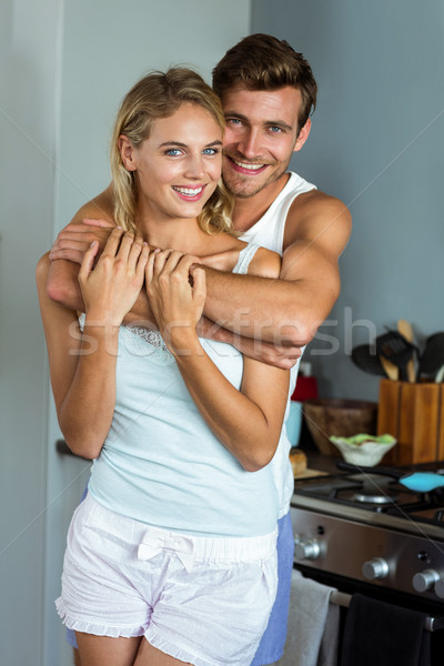 ロマンチックな 若い男 女性 後ろ キッチン ストックフォト © wavebreak_media