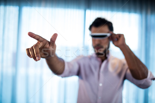Businessman using an oculus Stock photo © wavebreak_media