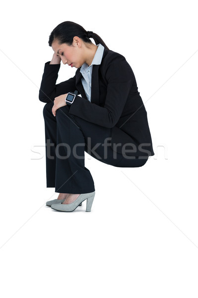 Depressed businesswoman sitting on steps Stock photo © wavebreak_media