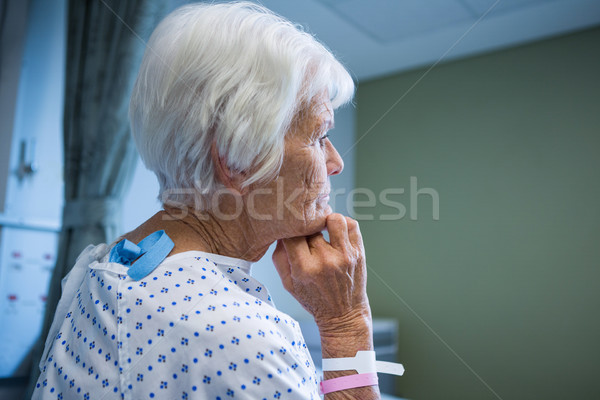 Stock photo: Senior patient standing at hospital