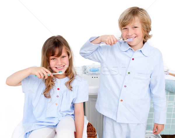 Cute children brushing their teeth Stock photo © wavebreak_media