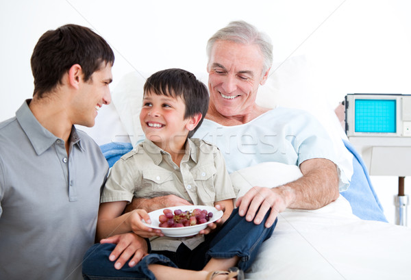 Stock photo: Smiling father and his son visiting grandfather