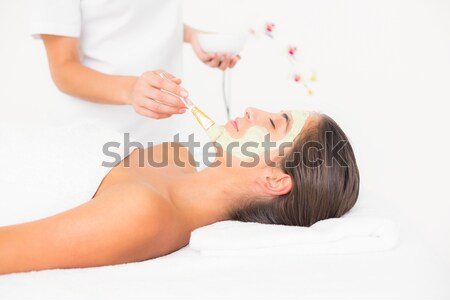 Stock photo: Attractive woman enjoying a head massage