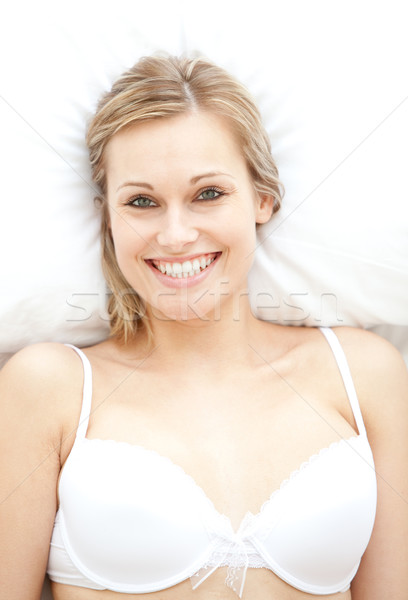 Uśmiechnięta kobieta bielizna bed domu kobieta twarz Zdjęcia stock © wavebreak_media