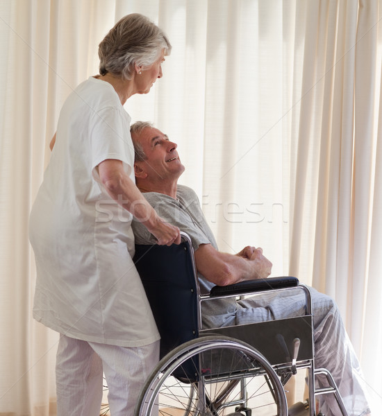 Retired couple looking out the window Stock photo © wavebreak_media