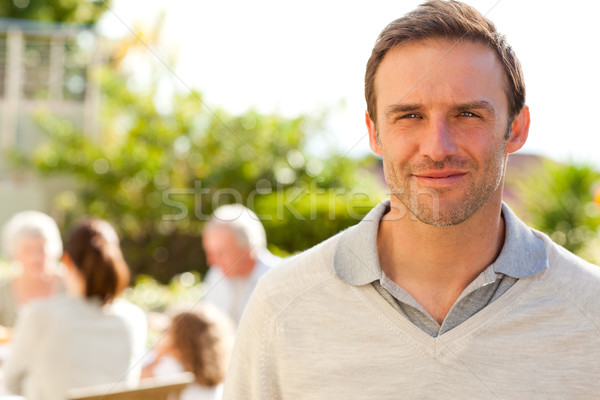 Homme regarder caméra jardin fille nature [[stock_photo]] © wavebreak_media