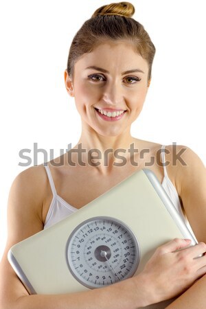 Portrait of a young woman working out against a white background Stock photo © wavebreak_media