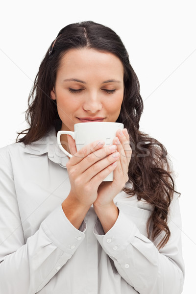 Brunette thé blanche sourire costume tasse [[stock_photo]] © wavebreak_media