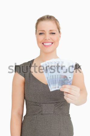 Сток-фото: женщина · улыбается · евро · вентилятор · белый