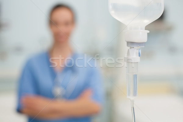 Phial in front of a nurse in hospital room Stock photo © wavebreak_media