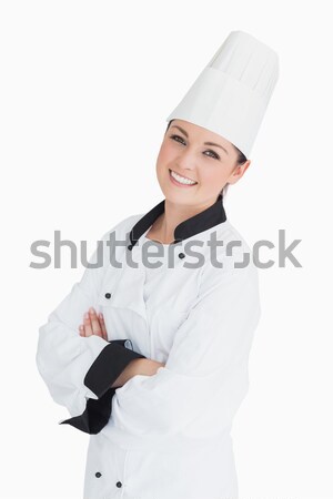 Smiling chef on white background Stock photo © wavebreak_media