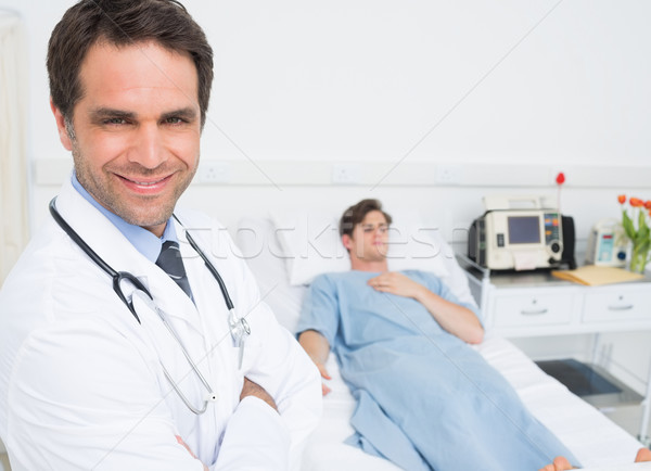 Confident male doctor in hospital ward Stock photo © wavebreak_media