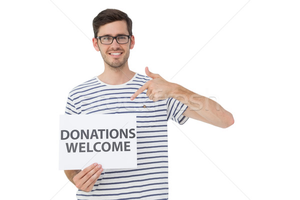 Man pointing at donation welcome note Stock photo © wavebreak_media