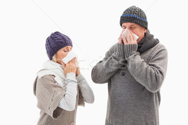 Sick mature couple blowing their noses Stock photo © wavebreak_media