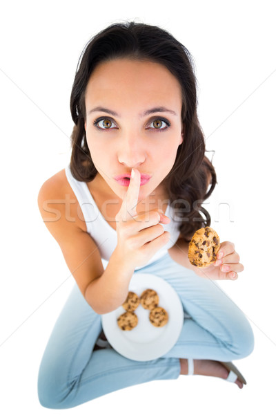 довольно брюнетка еды пластина Cookies белый Сток-фото © wavebreak_media