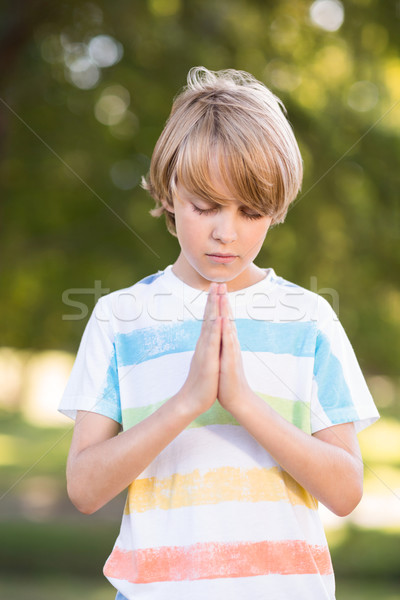 Little boy saying his prayers Stock photo © wavebreak_media