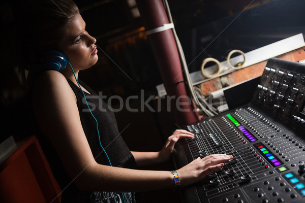 Female audio engineer using sound mixer Stock photo © wavebreak_media