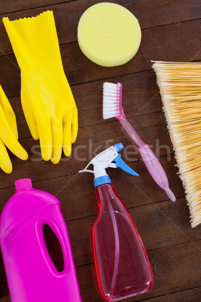 Various cleaning equipment arranged on wooden floor Stock photo © wavebreak_media