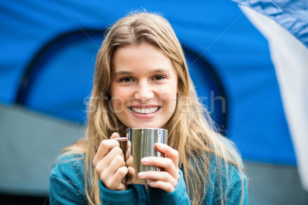 Portrait of a young pretty hiker sitting in a tent Stock photo © wavebreak_media