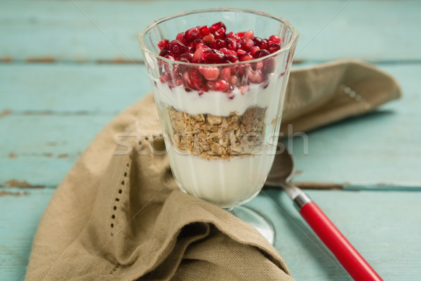 Cup of yogurt with raspberry and pomegranate Stock photo © wavebreak_media