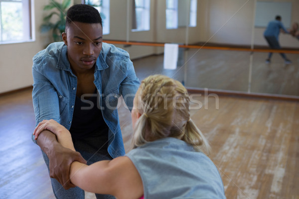 Man looking at friend while dancing Stock photo © wavebreak_media